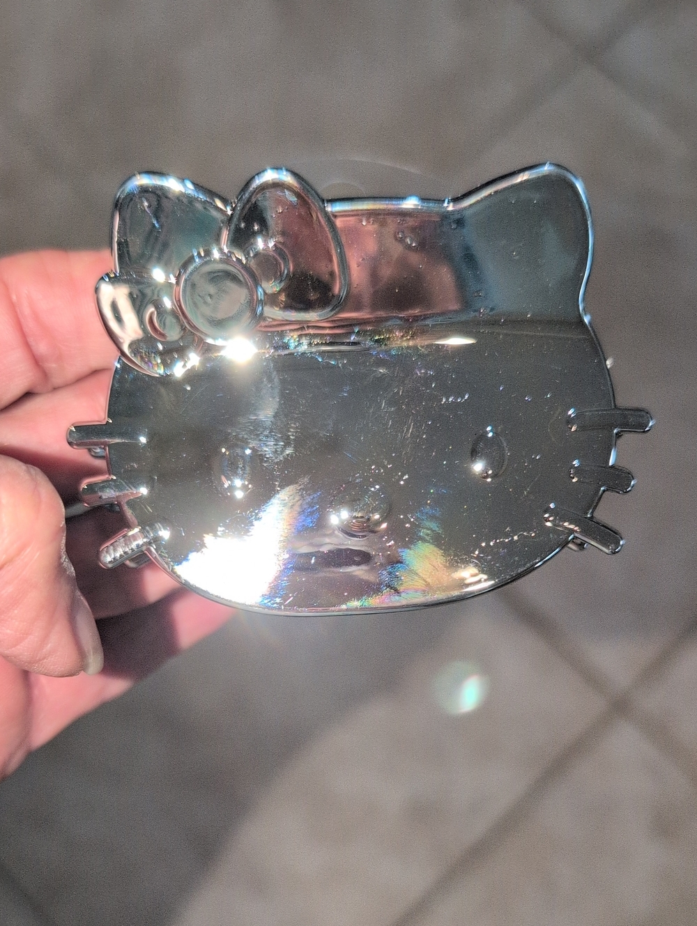 Hello Kitty Silver Toned Chromed Face And Bow Hair Clip
